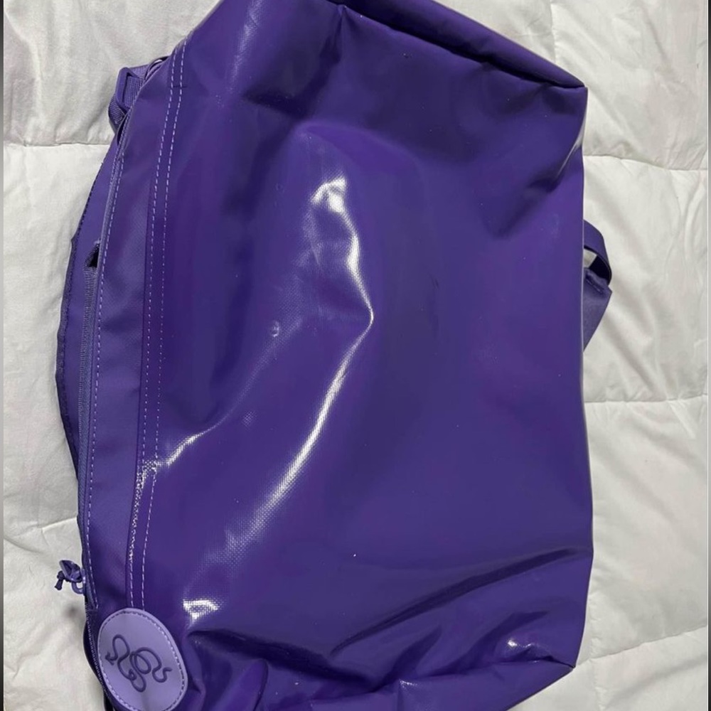 Like new 32L mini baboon to the moon bag purple